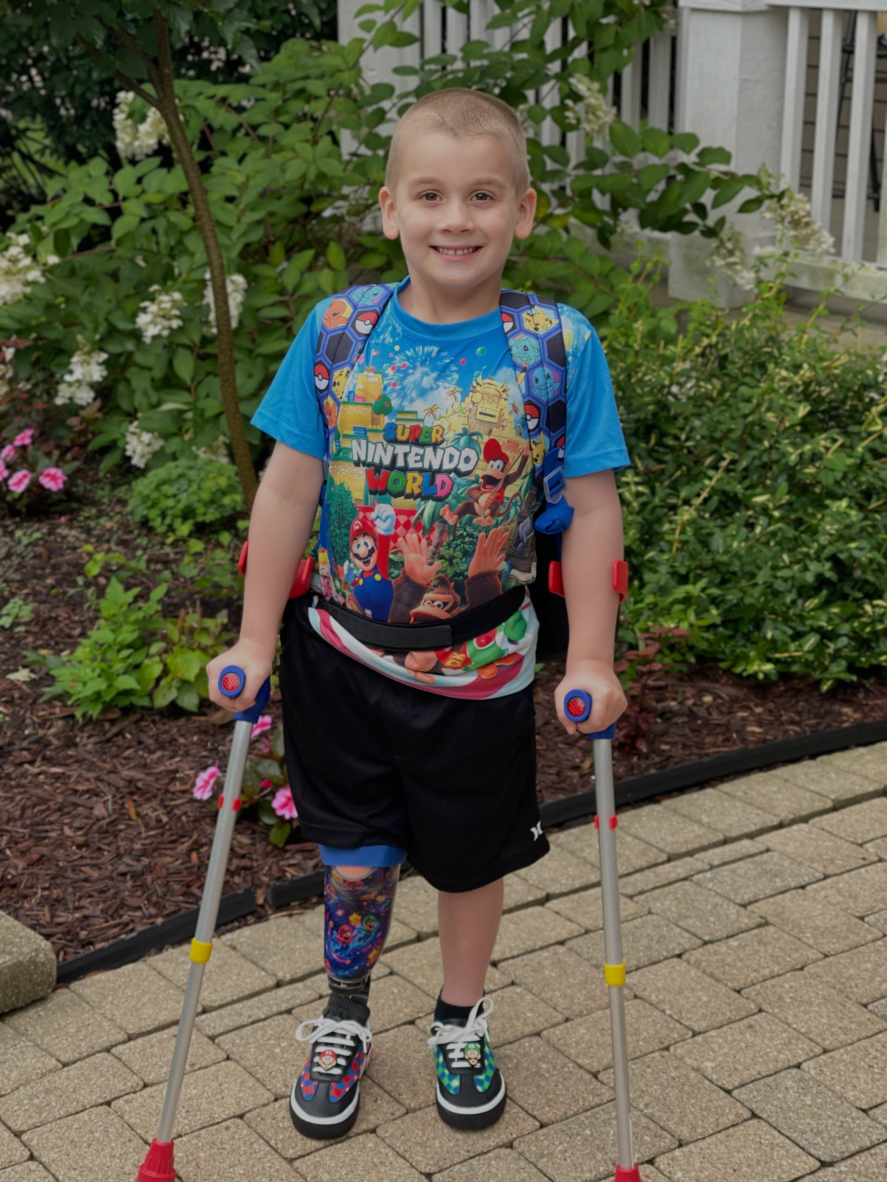 Hero Connor smiling in a Gamerosity superhero cape